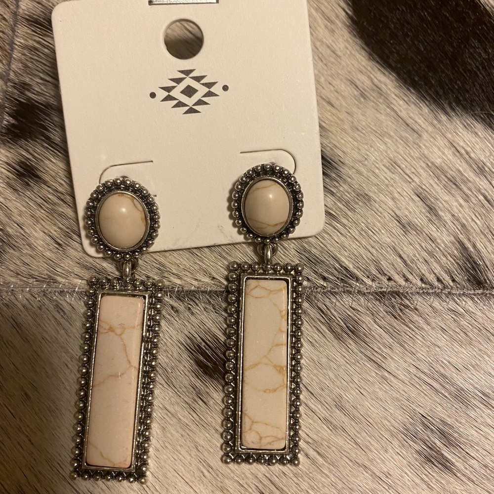 white stone studded earrings. new